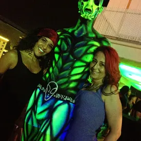 Red and Heather with their alien